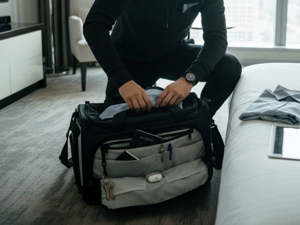 How to pack a personal item bag for underseat cabin no baggage airline fees